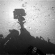 Illustration for article titled A New NASA Conspiracy: Does This Photo Show a Man Fixing the Mars Rover?